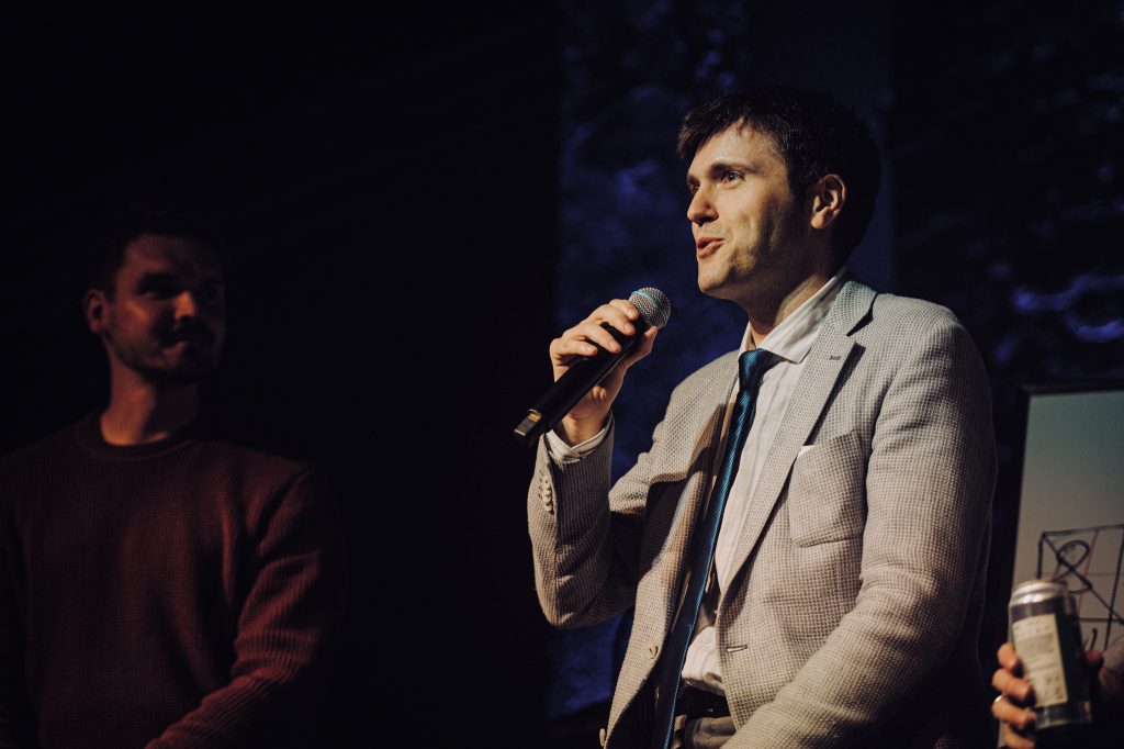 Associate Professor Dr. Rosen Dimov speaking on stage